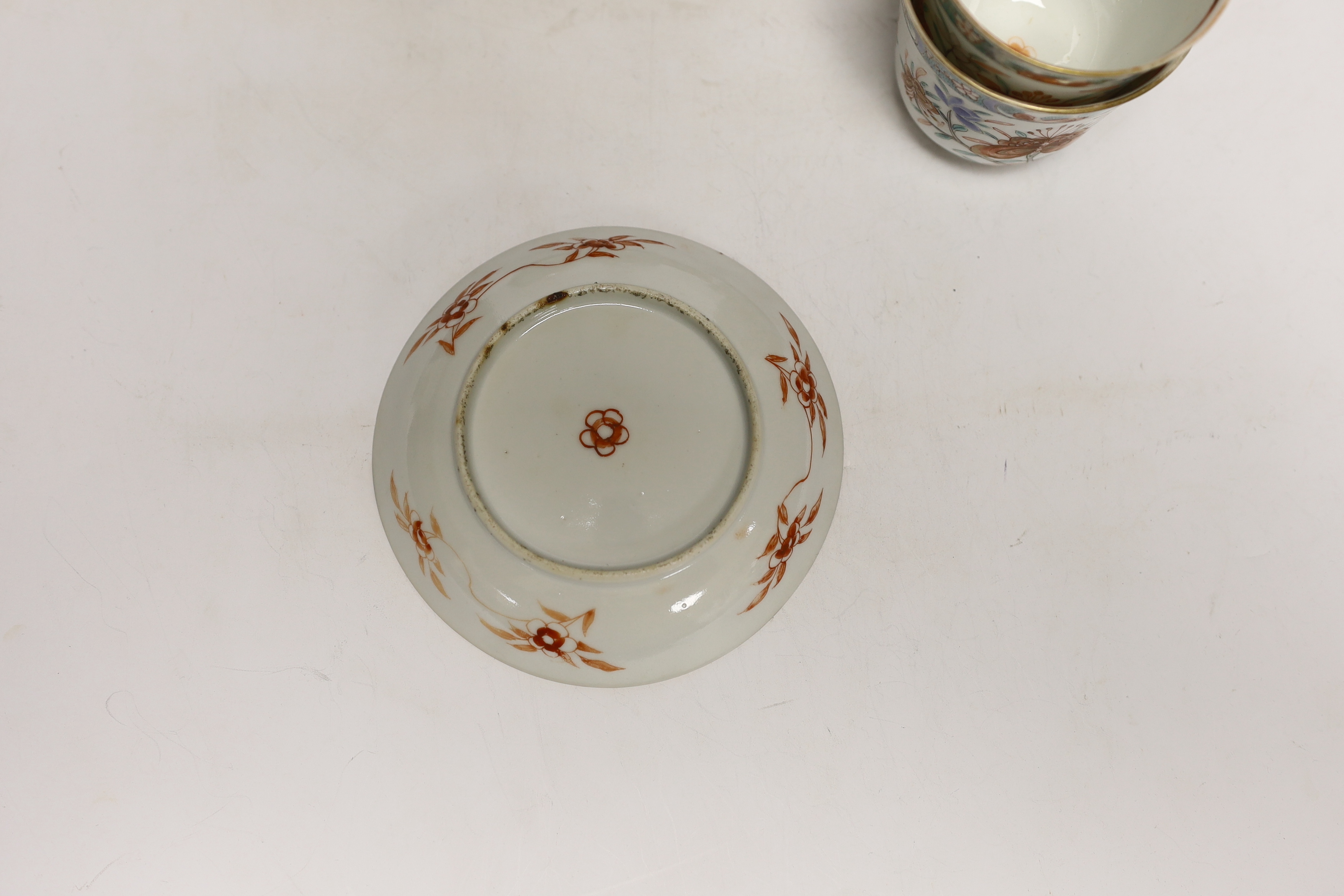 A set of six early 18th century Chinese cups and saucers with Dutch enamelled decoration, c.1710, 7.5cm high